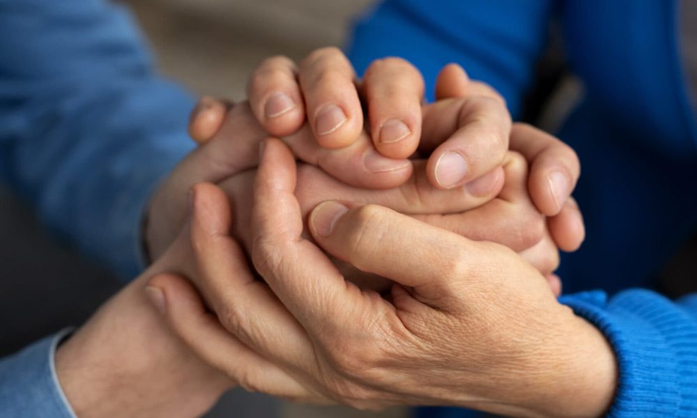 hands-holding-each-other-support hands-holding-each-other-support